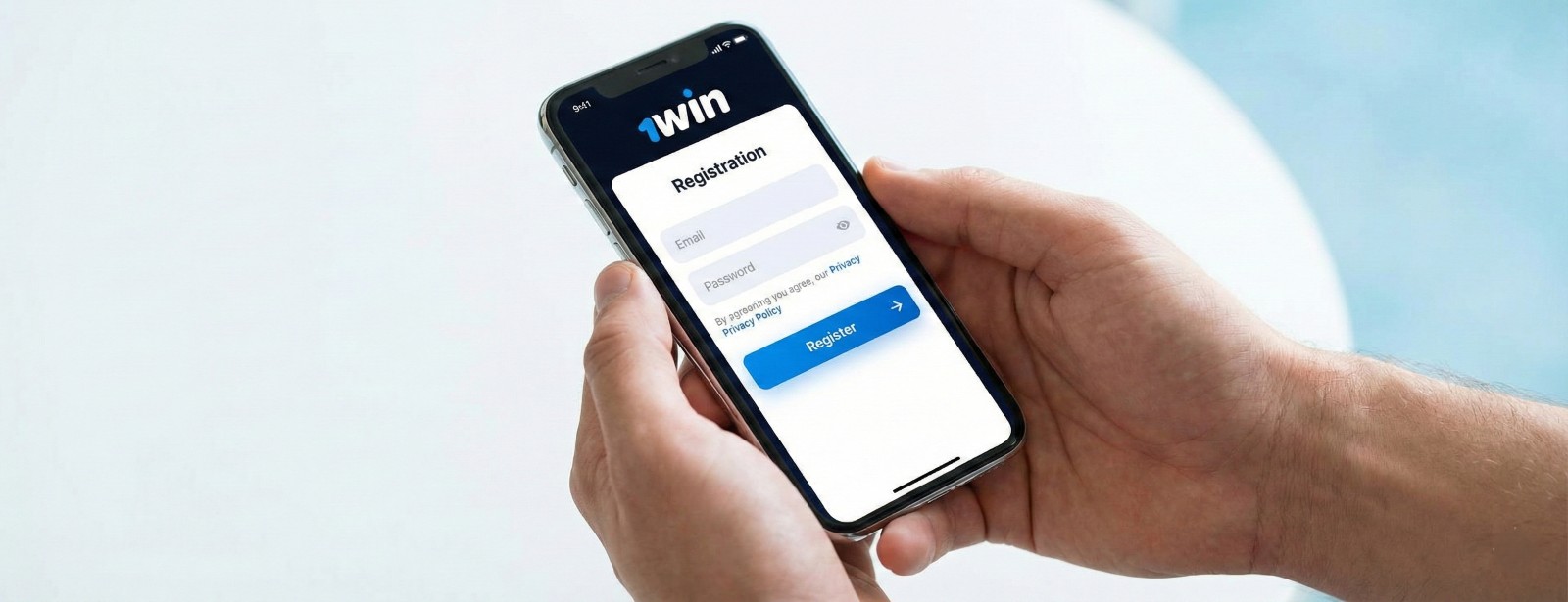 A person holding a smartphone displaying the 1win registration page with fields for email, password, and a blue register button